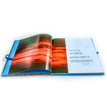 Quality assured custom hardcover art book with ribbon